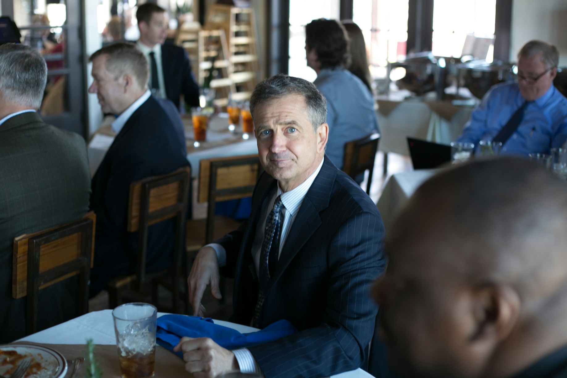 Dave, a charter operator in his fifties, photographed at an FBO lounge
