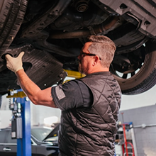 Hank, a master technician in his late fifties, decades on the tools